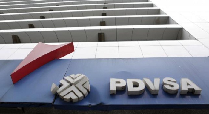Venezuela`s PDVSA asks partners to pick up tab as oil prices sink